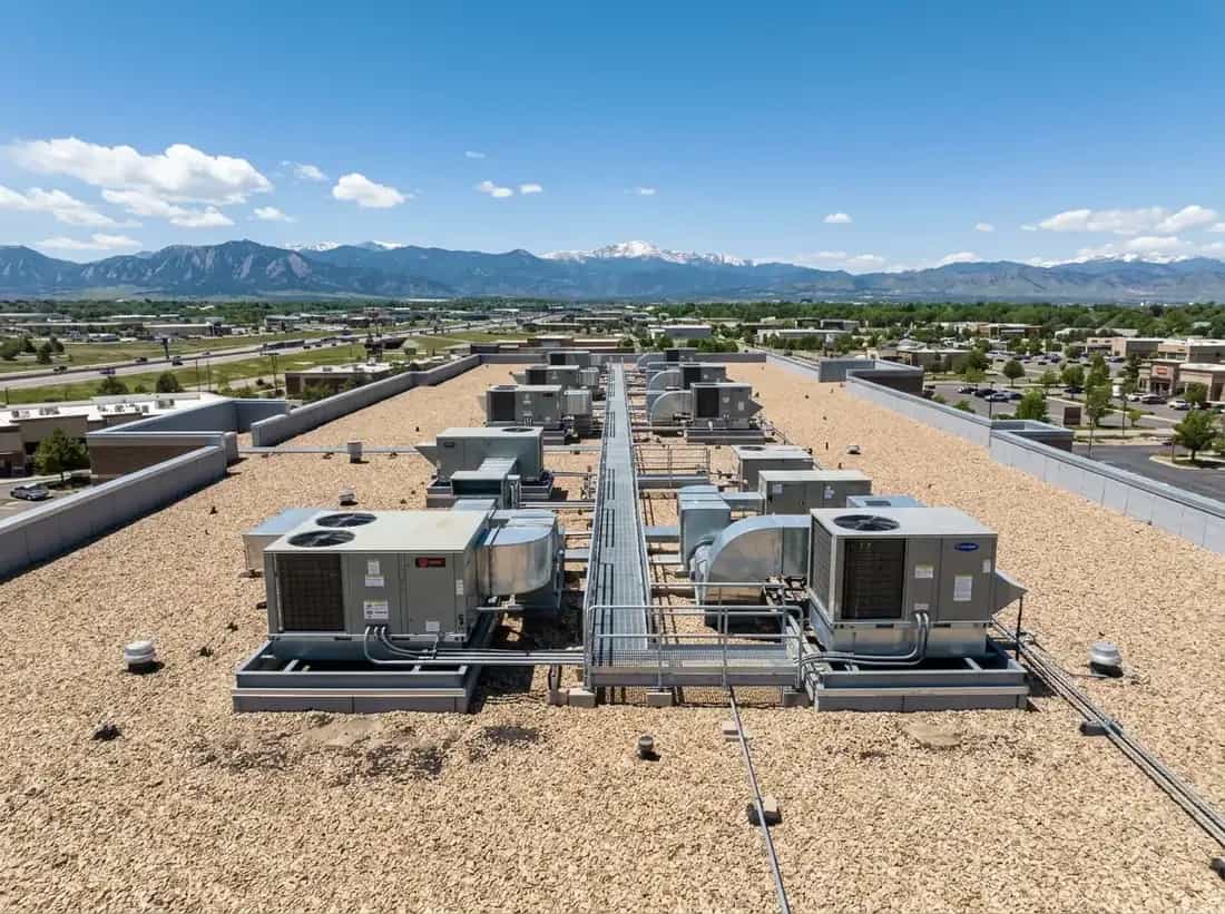 Illustrative representation of a built-up roof with a gravel-ballast surface on a Colorado commercial building