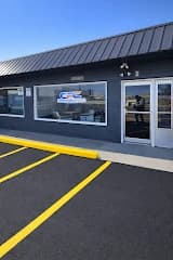 The Commercial Roofing Contractor Grand Junction office building seen from the parking lot