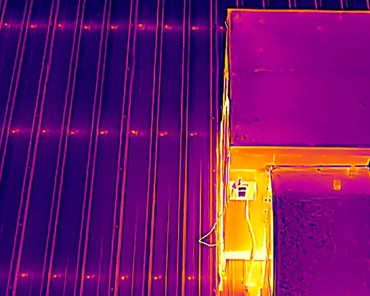 Second drone thermal scan of the same Grand Junction commercial metal roof, mapping moisture and temperature differences across the roof field