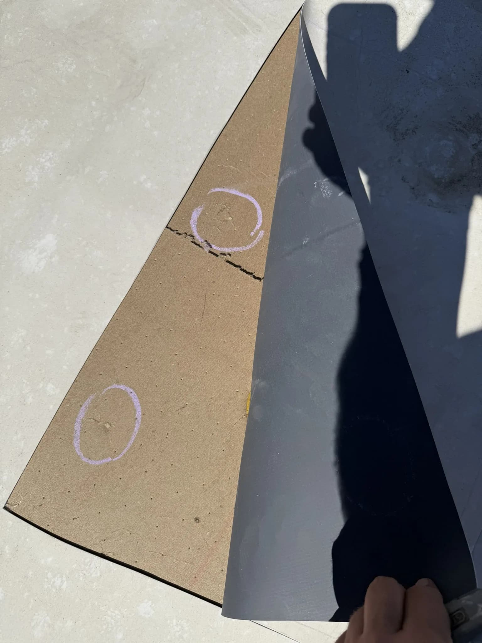 Hail impact points circled in marker across a commercial roof in Denver, Colorado during CRC's storm-damage documentation