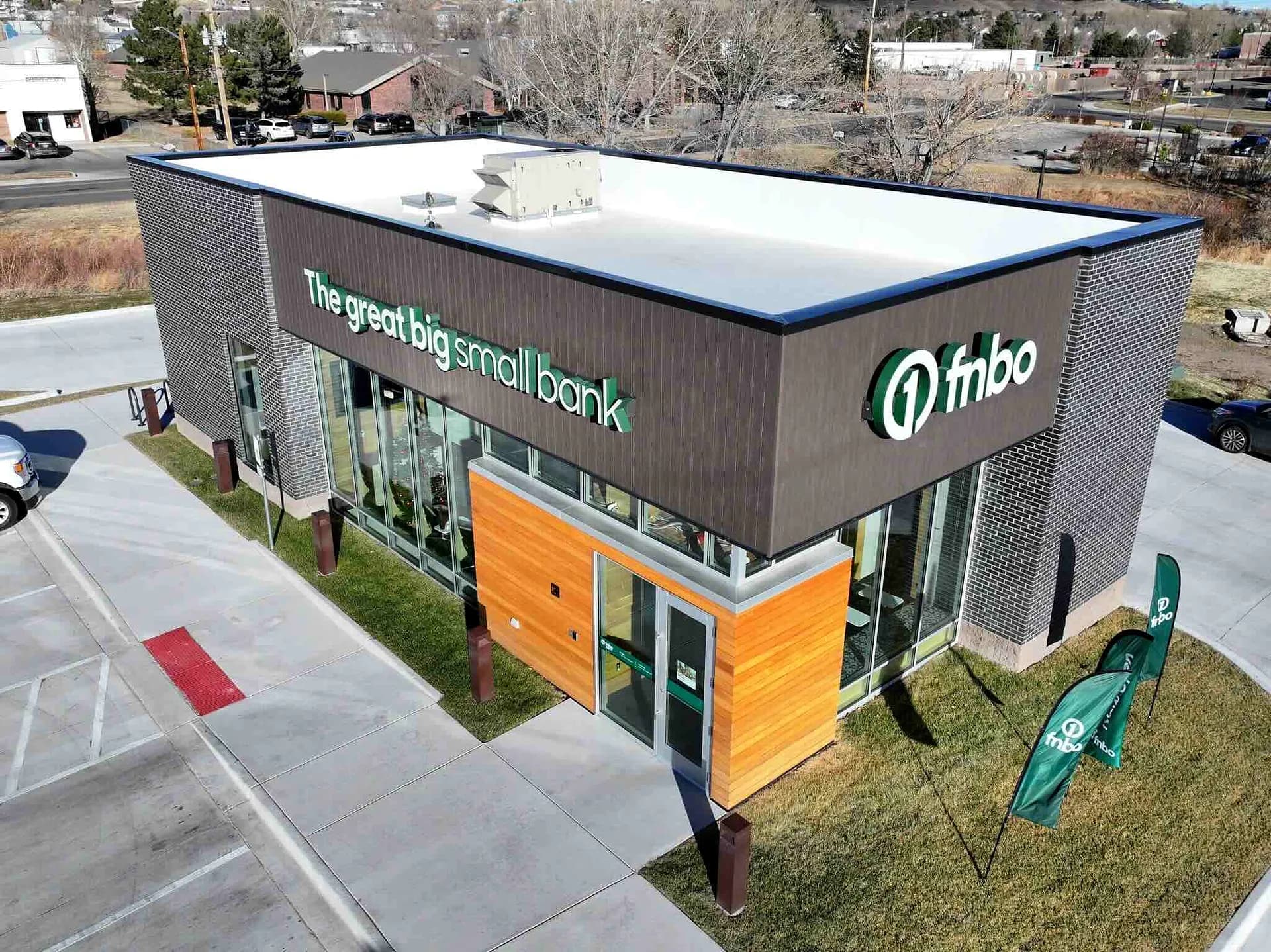 Aerial view of a completed commercial TPO roof on the FNBO bank building in Denver, Colorado