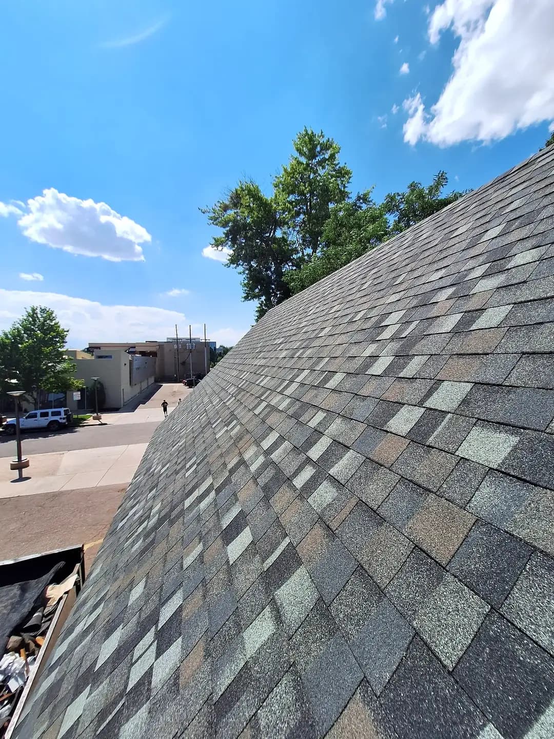 Completed IKO Nordic Class 4 impact-resistant architectural shingle roof on a steep hip in Cherry Creek North, Denver, Colorado