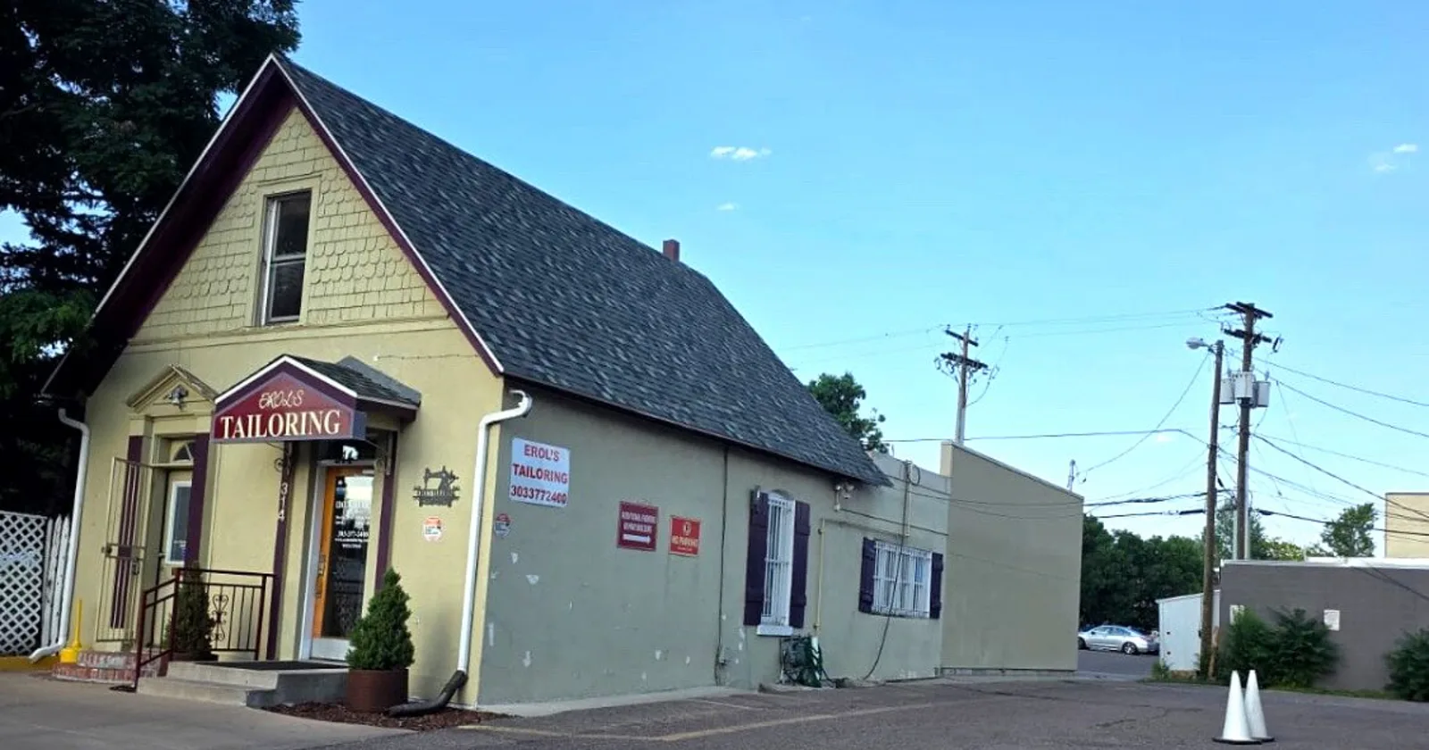 Erol's Tailoring and Alterations in the Cherry Creek North neighborhood of Denver, Colorado, with its completed IKO Nordic Class 4 impact-resistant shingle roof