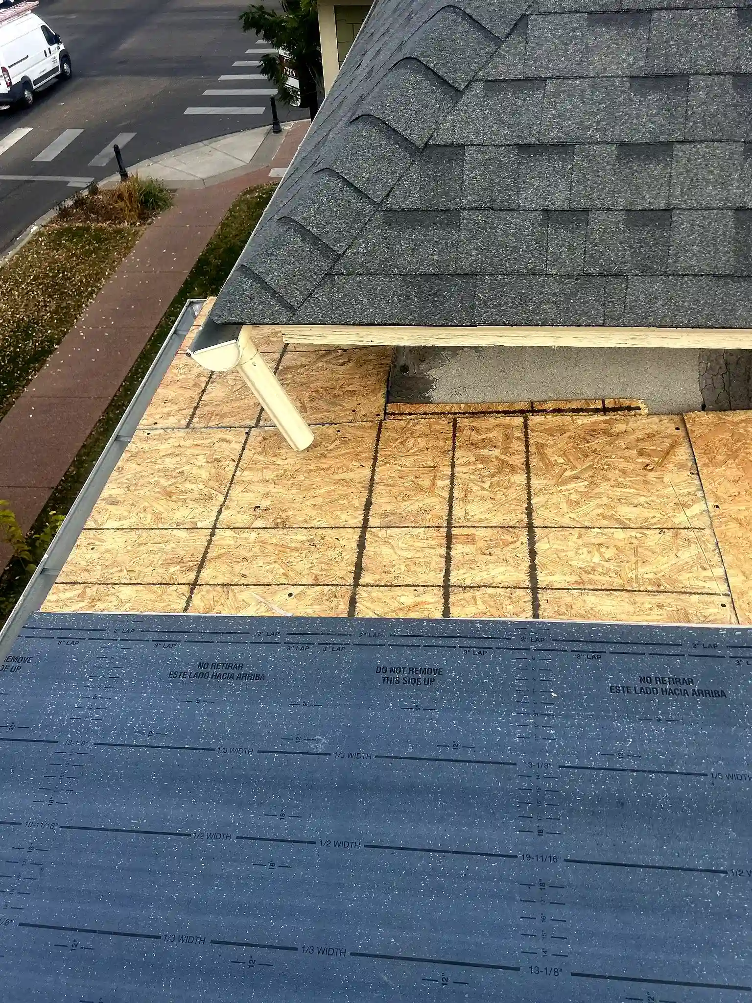 New OSB roof decking and synthetic underlayment installed to code on a Grand Junction historic home