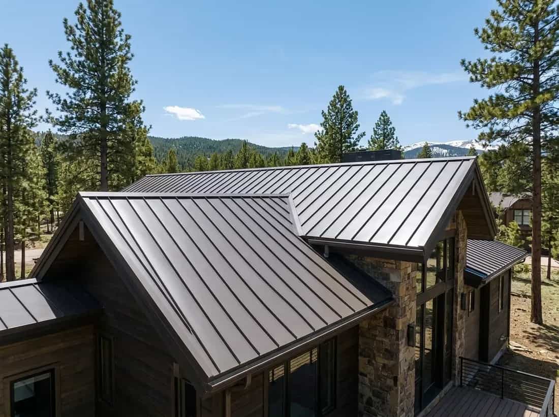 Illustrative representation of a standing-seam metal roof on a mountain-style Colorado home